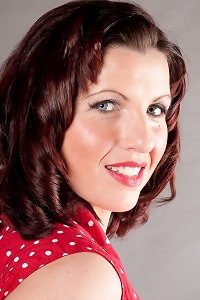 a bare woman getting her yam-sized hooters pounded in the bed